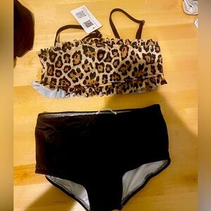 Brand new with tags. Size 12 girls bathing suit.